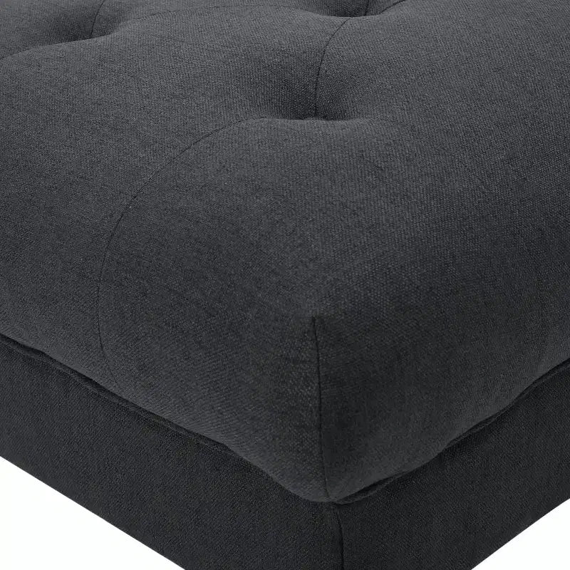 Pouf quadrato capitonné con cuciture a rombi e gambe in betulla