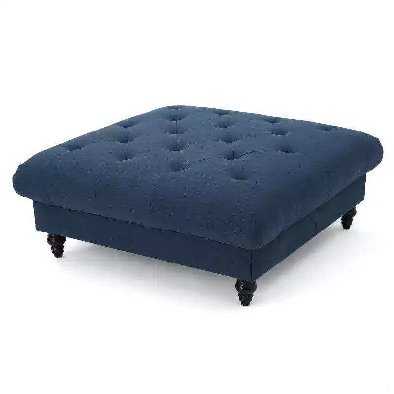 Pouf quadrato capitonné con cuciture a rombi e gambe in betulla