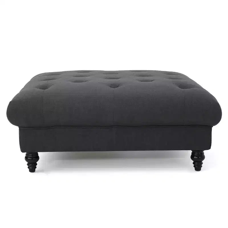 Pouf quadrato capitonné con cuciture a rombi e gambe in betulla